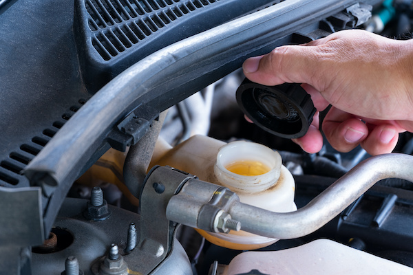 Checking car brake fluid 